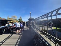 A group of people on a bridge

AI-generated content may be incorrect.