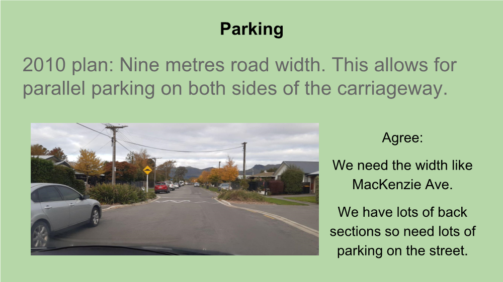 A road with cars parked on it

AI-generated content may be incorrect.
