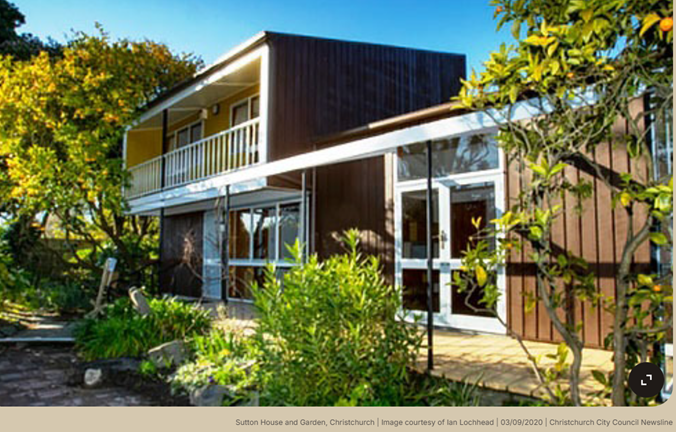 A house with a porch and plants

AI-generated content may be incorrect.