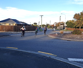 A group of people riding bicycles on a street

AI-generated content may be incorrect.