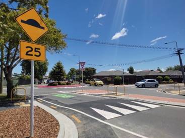 A road sign on a street

AI-generated content may be incorrect.