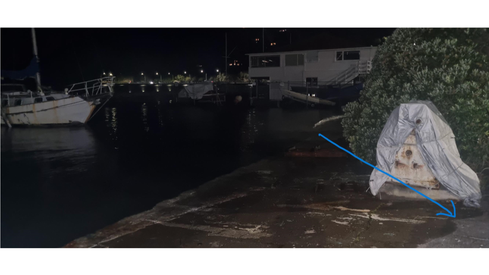 A person standing on a dock at night

AI-generated content may be incorrect.