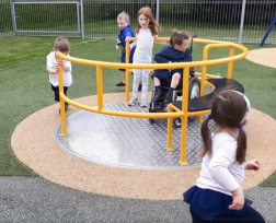A group of children playing on a playground

AI-generated content may be incorrect.